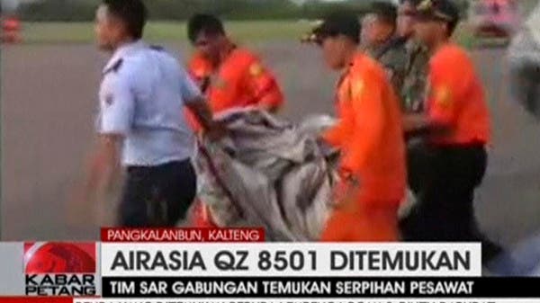 AirAsia victim with life jacket raises questions about planes.