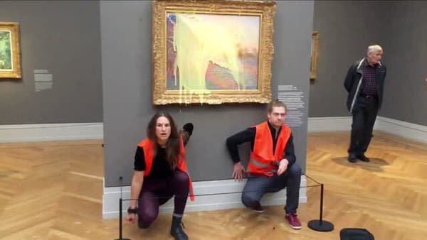 German Climate Activists Throw Mashed Potato At Monet Painting In Museum