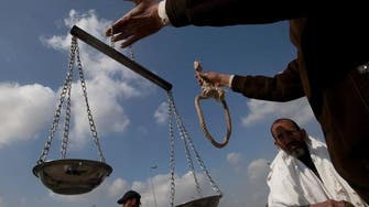 Egypt upholds death sentence for 12 for murder of policeman 