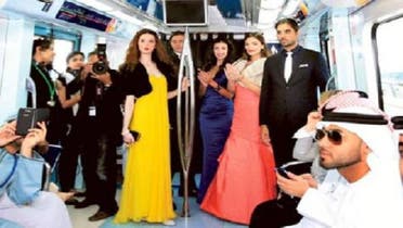 Models display Bloomingdales news collection at a special fashion catwalk on a moving Metro train in Dubai. (Photo Coutesy: Gulf News)