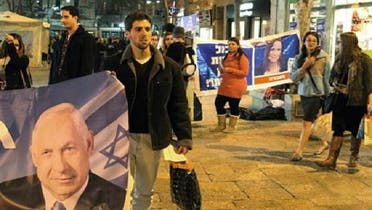 اسرائیل میں پولنگ سے 24گھنٹے قبل سیاسی جماعتوں کے کارکنان انتخابی مہم چلا رہے ہیں۔