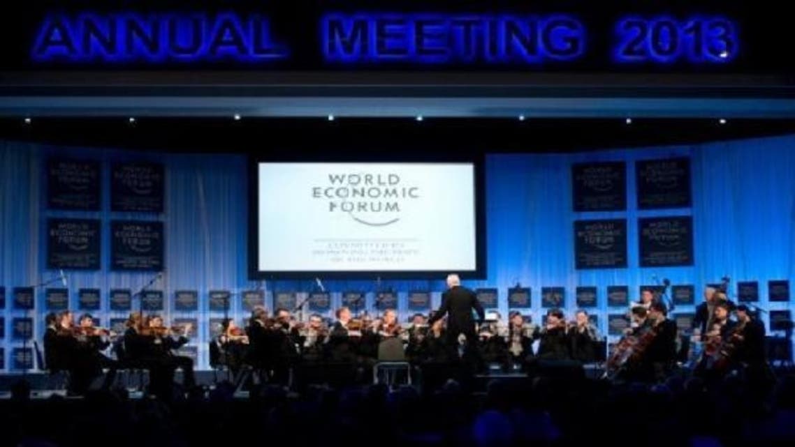 An orchestra plays at the opening ceremony of the World Economic Forum (WEF) at the congress center at the Swiss resort of Davos, on Jan. 22, 2013. (AFP)