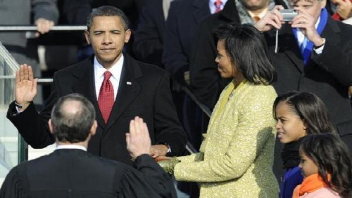 President Barack Obama took the oath of office with his family by his side and using his wife\'s family bible. (AFP)