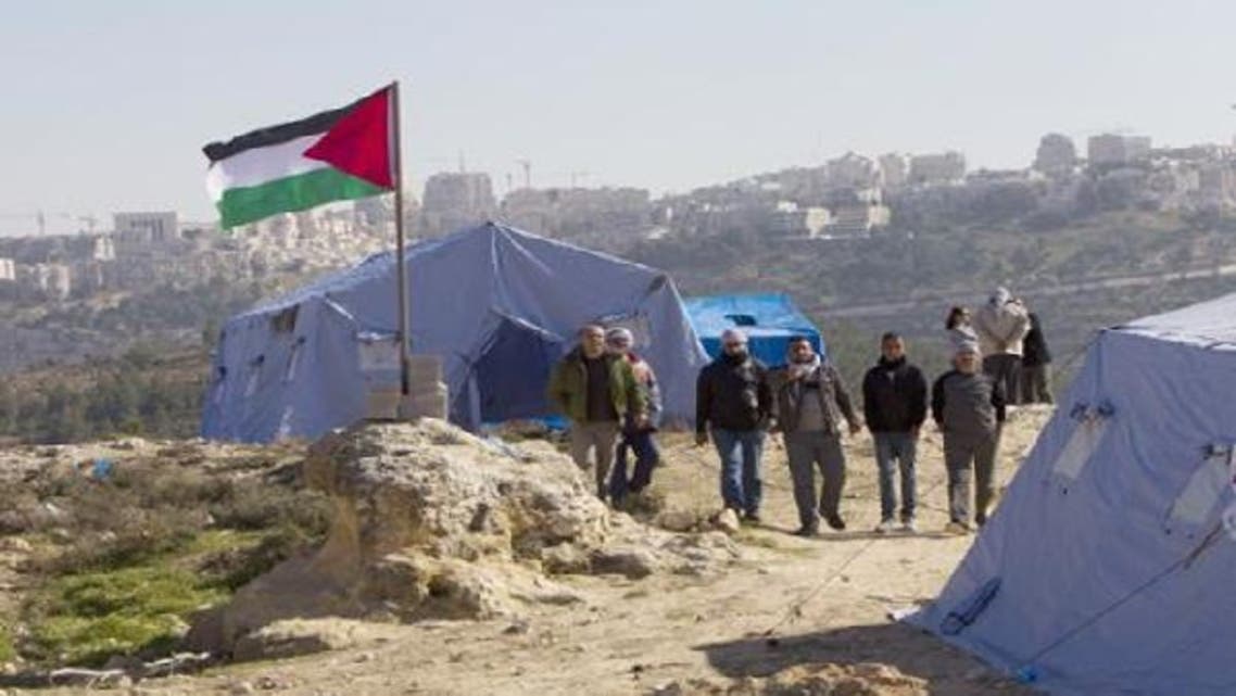 About 100 activists and organizers of the Bab al-Karama initiative staged a protest against confiscation of Palestinian land by Israeli forces. (Photo of Felesteen.ps)