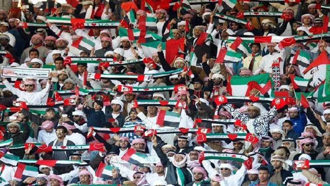 UAE fans cheer their team during their match against Kuwait at the Gulf Cup Tournament semi-final soccer match in Isa Town, Jan. 15, 2013. (Reuters)