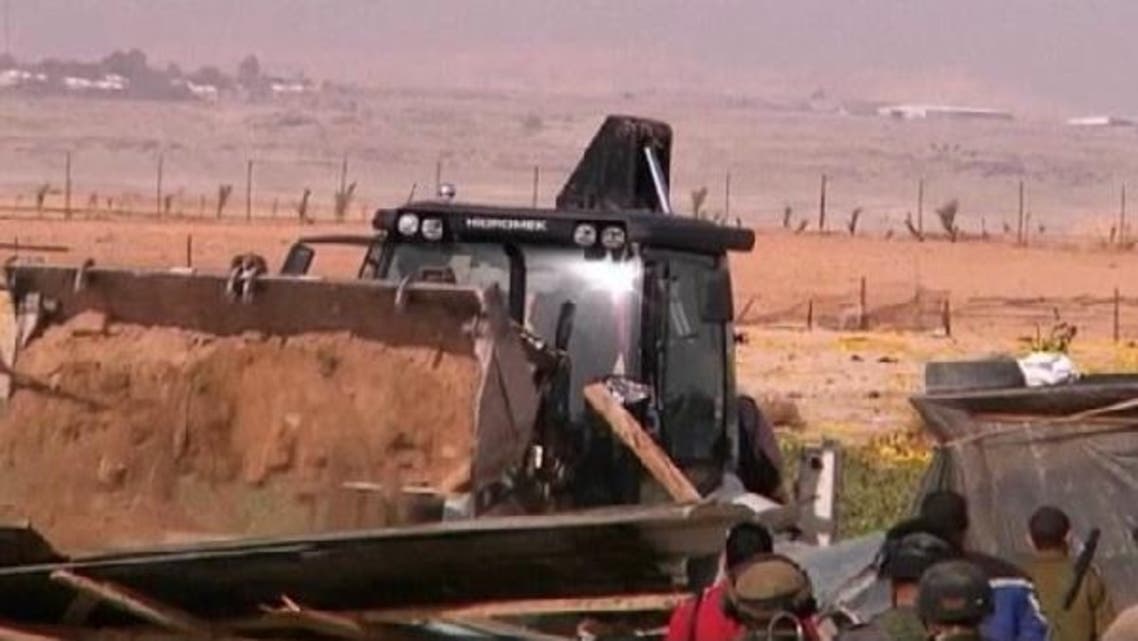The Israeli military flattens metal and plastic makeshift shelters erected by Bedouins in the Palestinian West Bank Governorate of Jericho. (Reuters)