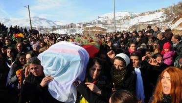 People carry the coffin of the Kurdish activist Sakine Cansiz, shot dead in the French capital, on January 18 in Tunceli. (AFP)