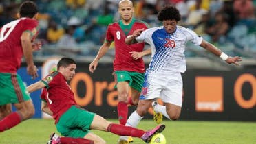 Cape Verde’s Ryan Mendes (R) dribbles the ball past Morocco’s Issam El Ado (L), Abdelaziz Barrada and Karim El Ahmadi (2nd R) during their African Nations (AFCON 2013) Cup Group A soccer match in Durban Jan.23, 2013. (Reuters)