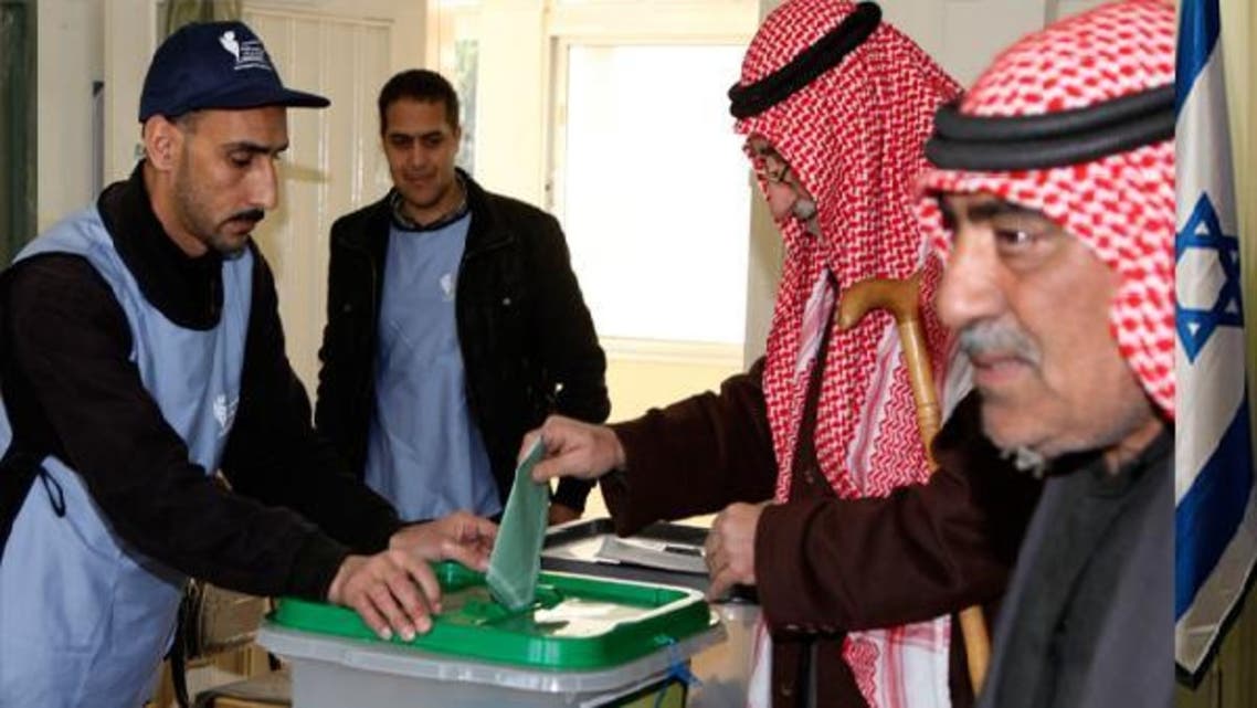 A man casts his ballot at a polling station in Amman Jan. 23, 2013. Jordanians voted on Wednesday in their first parliamentary elections since the Arab Spring revolts, but a boycott by the main Islamist party will ensure no repeat of an Egypt-style revolution via the ballot box. (Reuters)