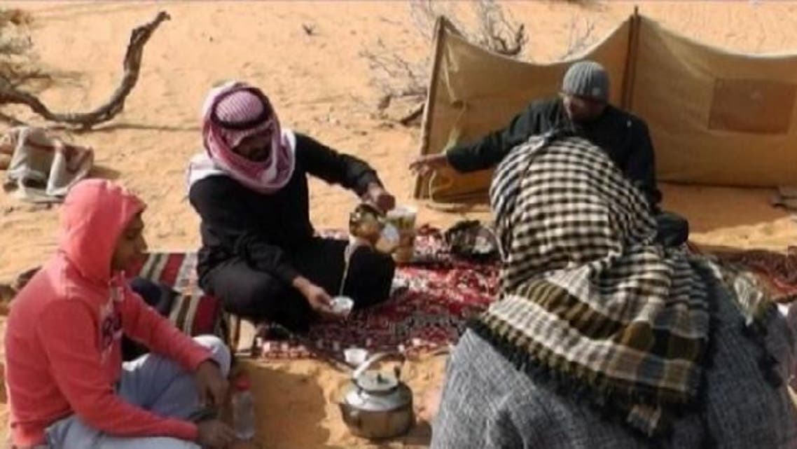 Saudi men seeking to escape crowded cities pack up and head to ad-Dahna for a few days of simple desert life. (Reuters)