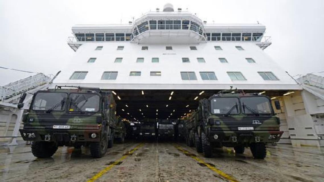 Military vehicles of a Patriot missile system are loaded on a ship in the harbour of Travemuende, January 8, 2013. Germany, the Netherlands, and the United States are each sending two Patriot missile batteries and up to 400 troops to Turkey after Ankara asked for NATO’s help to bolster security along its 900-km (560-mile) border with Syria. (Reuters)