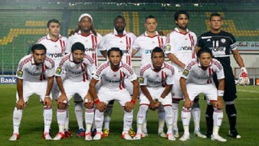 Egypt\'s Zamalek\'s players pose for a photograph before their African Champions League soccer match aginst Egypt\'s Al Ahly match at the Military Stadium in Cairo July 22, 2012 ( Reuters)