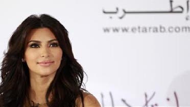 TV personality Kim Kardashian attends a news conference in Dubai October 13, 2011. (Reuters)