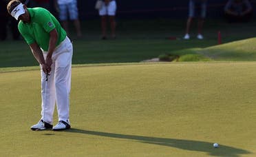 Luke Donald of England putts the ball during the first round of the DP World Tour Championship in Dubai. (File photo: AFP)
