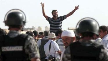 شامی مہاجرین اردنی کی سرحد کے نزدیک صدر بشار الاسد کے خلاف احتجاجی مظاہرے میں شریک ہیں