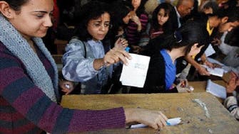 Group of Christian women banned from voting in Egypts referendum