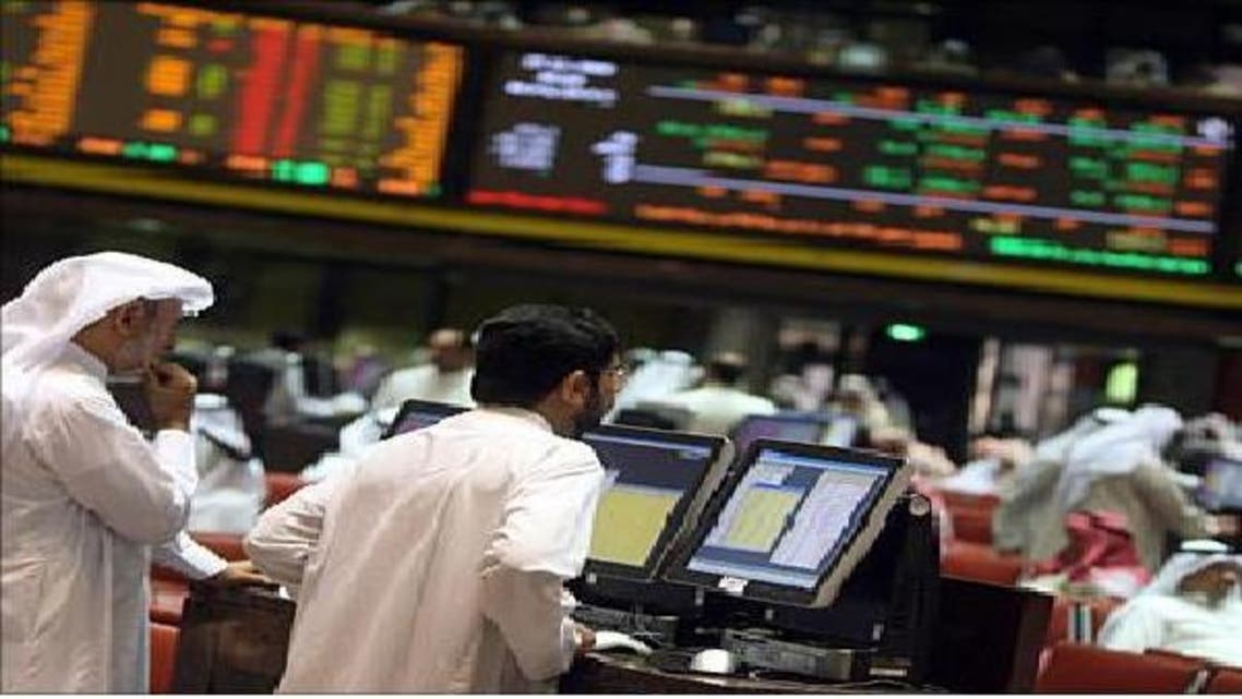 متداولون في سوق الكويت للأوراق المالية