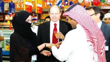 Abdulla Alanazi, exchanged rings with his fiancé at Carrefour supermarket, witnessed by other employees. (Photo courtesy Saudi Gazette)
