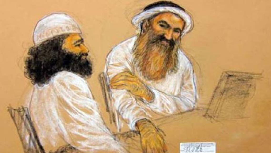 With his orange beard, Khalid Sheikh Mohammed appears at his arraignment in this courtroom sketch. (Reuters)