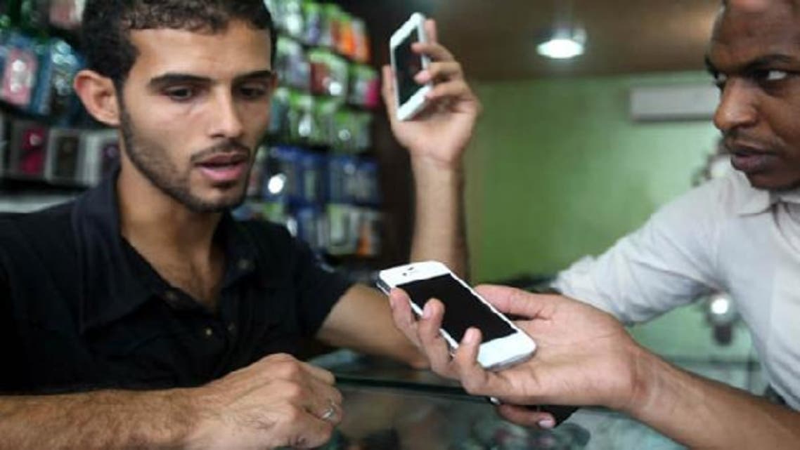 New iPhones have been available for a couple of weeks in Gaza and they were on display on Monday in three independent mobile stores in downtown Gaza City. (Photo courtesy of Palestinian Media Center)