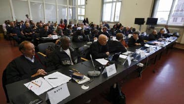 Somali alleged pirates sit with their lawyers in a courtroom of a Hamburg district court. (Reuters)