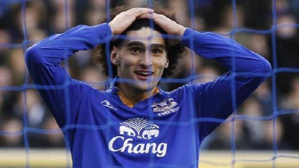 Due to his injury, it is uncertain whether Fellaini will join Belgium and play against Serbia. (Reuters)