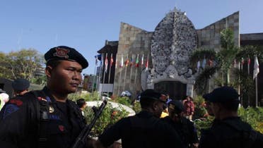 An Indonesian policeman stands guard at the 2002 Bali bombing memorial monument, ahead of the 10-year anniversary of the incident in Kuta, Bali resort island October 11, 2012. (Reuters)