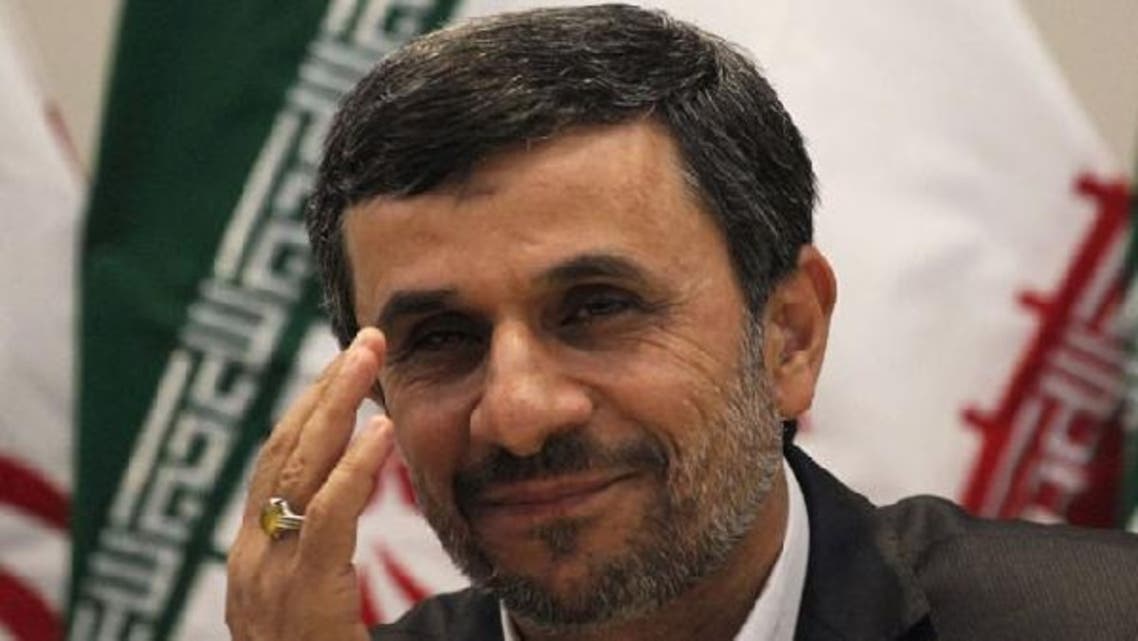 Ahmadinejad (c) has seen his influence wane within Iran’s factionalized political structure following a public spat with Khamenei in 2011.(Reuters)