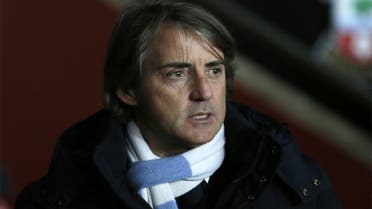 Manchester City's manager Roberto Mancini reacts before their Englsih Premier League soccer match against Southampton. (Reuters)