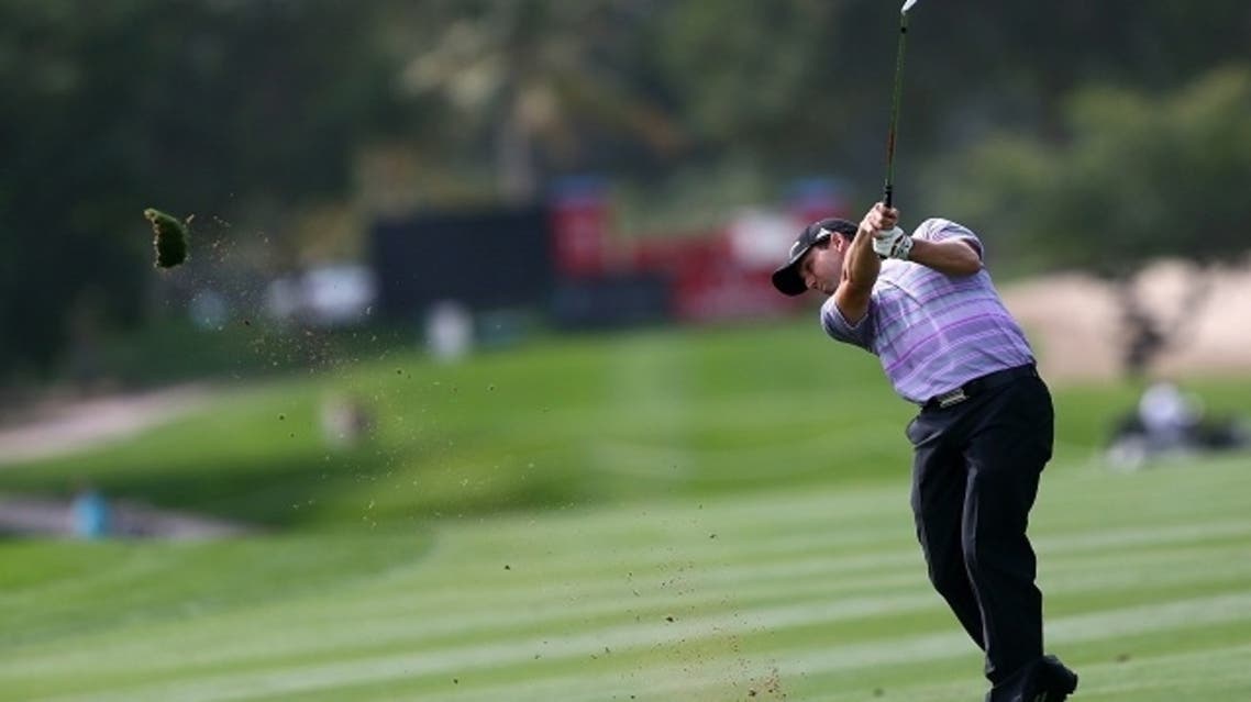 Sergio Garcia of Spain plays a shot during the second round of the Dubai Desert Classic golf tournament in the Gulf emirate of Dubai on February 1, 2013. (AFP)