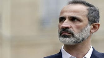 Syria’s opposition chief demands women prisoners freed