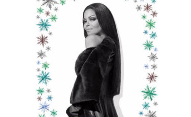 “Season’s Greetings! Love, Janet,” the superstar tweeted on Dec. 22 along with a card showing her donning a glamorous fur coat that slips down to show her shoulder.
