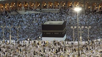 Pilgrims swallow ‘kiswa’ threads seeking blessings in Makkah