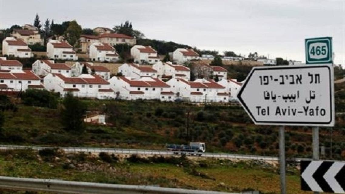 Houses in the Jewish settlement of Halamish are seen from a road near West Bank city of Ramallah Feb. 1, 2013. (Reuters)