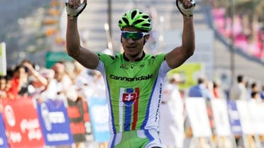Cannondale rider Peter Sagan of Slovakia celebrates near the finish line during the 146km (90.7 miles) second stage of the Tour of Oman cycling race from Fanja in Bidbid to Al Bustan, in Muscat February 12, 2013. (Reuters)