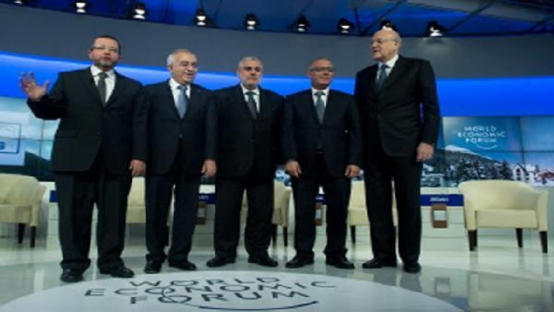 (L-R) Egyptian Prime Minister Hisham Qandil, Palestinian Prime Minister Salam Fayad, Chief of Government of Morocco Abdelilah Benkirane, Libyan Prime Minister Ali Zeidan and Lebanon prime minister Najb Mikati pose before a session of the World Economic Forum Annual Meeting 2013 on January 25, 2013 at the Swiss resort of Davos. (AFP)
