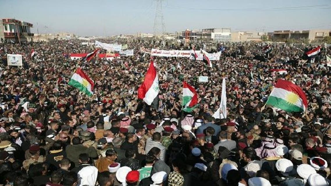 Iraqi protesters take part in a demonstration in the central city of Samarra January 11, 2013. (Reuters)
