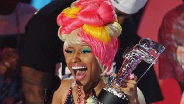 Singer Nicki Manaj poses at the 2011 MTV Video Music Awards in Los Angeles. Minaj is wearing couture by Dubai designer Furne One. (Reuters)