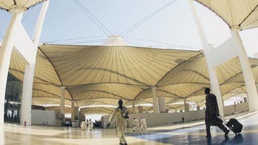 Government bonds for 2013 will be used towards improving King Abdul Aziz airport in Jeddah, which receives more than 20 million passengers a year along with Riyadh airport. (AFP)
