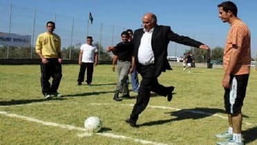 Palestinian Football Association chairman Jibril Rajoub shoots a ball during the opening ceremony of a new football field in the West Bank village of Al-Zawia. (Courtesy: Maan news agency)