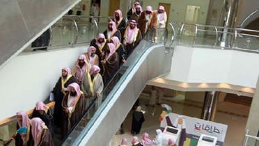 About 200 religious figures meeting at the labor ministry on Tuesday asked Minister Adel Fakeih to ban women from working in lingerie shops. (Photo courtesy of aleqt.com)