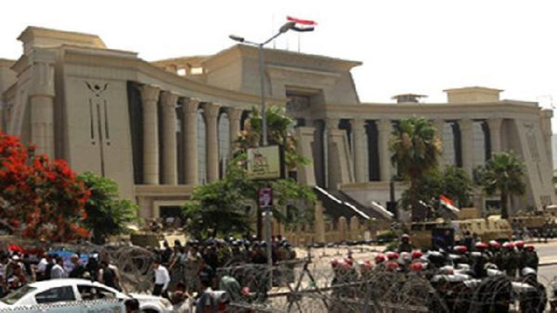 Hundreds of Islamists marched towards Egypt\'s Supreme Constitutional Court in Cairo last December. (AFP)