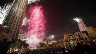 New Year fireworks illuminate worlds tallest building Dubais Burj Khalifa