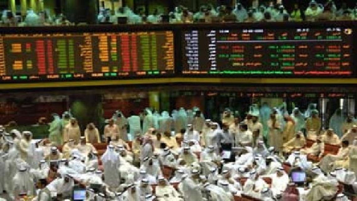 متداولون في سوق الكويت للأوراق المالية