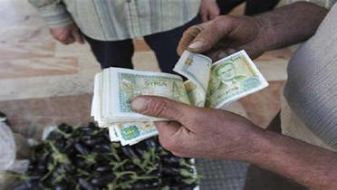أموال المعارضة تنعش سعر الليرة السورية في السوق السوداء
