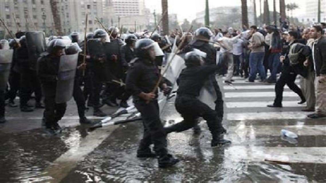 Anti-government protesters clash with police in downtown Cairo January 25, 2011. A new report reveals evidence against those accused of killing revolutionary protesters during Egypt’s upheaval. (Reuters)