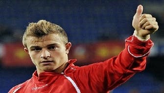 Shaqiri fires Swiss to injury-time win in Tunisia