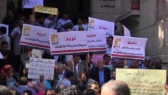 Egypts doctors strike and threaten mass resignations