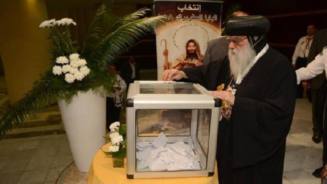 Egyptian caretaker of the Coptic Church Bishop Pachomius casting his vote to elect a new spiritual leader at the Saint Mark\'s Coptic Cathedral in Cairo last week. (AFP)