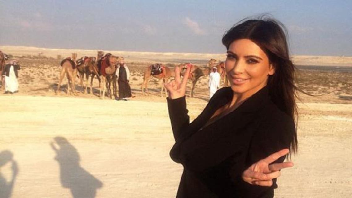 Kardashian’s twitter account flickered with pictures of Kim in the desert, with camels appearing in the background. (photo courtesy: Kim Karadashian’s Twitter account)